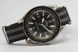 A Very Rare Gentleman's Omega 300, Circa 1960s, black dial luminous hour markers, Arabic numerals,