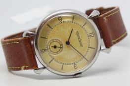 Gents Jaeger LeCoultre Vintage Wristwatch, circular patina dial with arabic numerals and baton