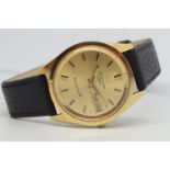 Gentleman's Favre-Leuba 18k Harpoon Day Date Wristwatch, circular gold dial with baton hour