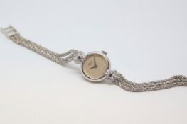 Ladies 18ct and diamond Chopard cocktail watch, circular dial with diamond set lugs, three strand