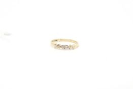 Three stone cubic zirconia ring, set in 9ct yellow gold, weighing approximately 1.3g