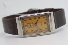 Gentlemen's Longines Vintage Wristwatch, rectangular patina bronze dial with minute track and Arabic