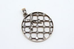 Diamond pendant, circular design with an openwork grid, with a rose cut diamond set to each cross