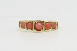 Victorian five stone coral ring, cabochon cut corals, in stepped graduated mount, in 15ct yellow