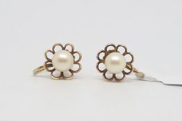 Pearl ear clips, single 5.7mm pearl in a floral surround, screw back fittings, mounted in yellow