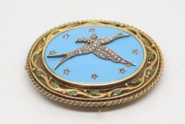 Enamel and diamond dove pendant/brooch, central diamond set dove holding ivy leaves in its beak,