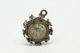 Compass pendant charm, measures 15mm diameter