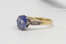 Sapphire ring, central old cut sapphire, measuring 8.1 x 6.8mm, claw set in yellow and white