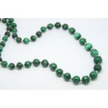 Malachite bead necklace, graduated malachite beads measuring 7.5 - 12mm, each separated by a metal