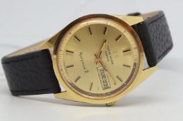 Gentlemen's Favre-Leuba 18k Harpoon Day Date Wristwatch, circular gold dial with baton hour