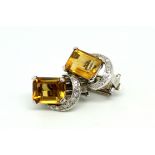 Citrine and diamond earrings, rectangular step cut citrine with a diamond set semi-circle above,