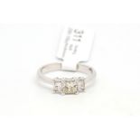 Three stone diamond ring, princess cut diamonds, principle diamond weighing an estimated 0.50ct,