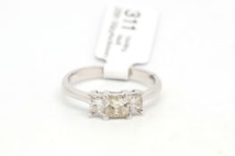 Three stone diamond ring, princess cut diamonds, principle diamond weighing an estimated 0.50ct,