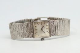 Ladies' Longines 9ct White Gold Vintage Wristwatch, square silver dial with baton hour markers, in