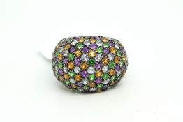 Gem set bombe ring, set with green, colourless, orange and purple stones, in 18ct white gold