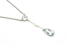 Aquamarine and seed pearl necklace, pear shaped aquamarine, suspended from a seed pearl set bar, and