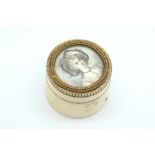 Ivory trinket box, with a hand painted portrait of a lady on the lid