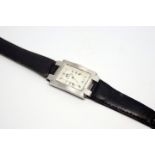 Guepard wristwatch, rectangular dial with Roman numerals,on a black leather strap