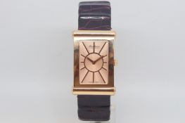 Baskania 18ct rose gold dress watch, rectangular salmon dial with radial rose gold hour markers 25mm