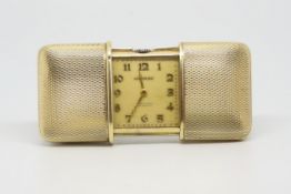 Movado Vintage Purse Watch, square champagne dial with Arabic numerals, 46mm rolled gold case when