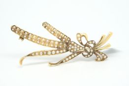 Seed pearl brooch, floral design set with split pearls, mounted in yellow metal tested as 9ct,