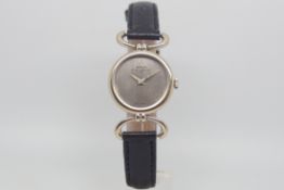 Ladies' 18ct Baume & Mercier, silvered dial, 24mm 18ct case and lugs, black leather strap