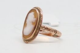 Edwardian cameo ring, oval cameo set within a decorative engraved rose gold mount with detailed