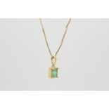 Single stone emerald pendant, rectangular emerald measuring 5.7 x 7.5mm, claw set in yellow metal