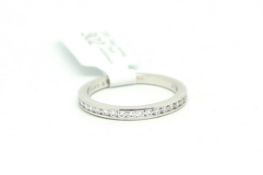 Tiffany & Co diamond half eternity ring, seventeen round brilliant cut diamonds weighing an