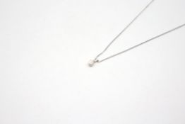 Single stone diamond pendant, round brilliant cut diamond weighing an estimated 0.20ct, four claw