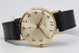 Gentlemen's Longines Gold Vintage Wristwatch, circular dial with interesting Arabic numerals with