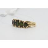 Green Tourmaline and diamond five stone carved half hoop ring, five graduating green tourmaline