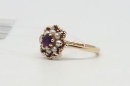 Amethyst and seed pearl cluster ring, set in 9ct yellow gold, hallmarked London 1969, ring size H1/