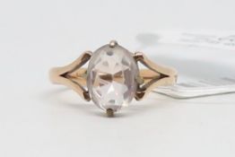 Single stone ring, oval cut colourless stone, set in yellow metal stamped 9ct, ring size M 1/2
