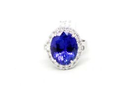 Tanzanite and diamond cluster ring, central oval cut tanzanite, weighing an estimated 9.09ct, with a