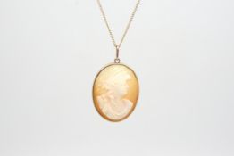 Victorian cameo pendant, in a yellow metal plain frame tested as 9ct, on a yellow metal chain