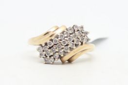 Diamond cluster ring, round brilliant cut diamonds, in a twist motif, weighing an estimated total of