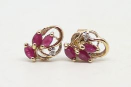 Ruby and diamond stud earrings, three marquise cut rubies and a single diamond, in 9ct yellow gold