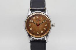 Vintage Roamer wristwatch, round circular dial with heavy patina, luminous Arabic numerals and