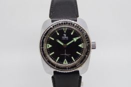 Vintage Yema divers watch, circular black gloss dial, bold luminous hour markers and fat arrow