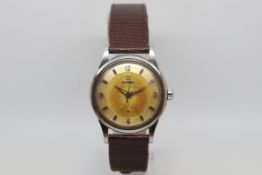 Gentlemen's Omega Constellation Vintage Watch, circular heavy patina pie pan cross hair dial with
