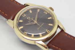 Gentlemen's Omega Automatic Seamaster Vintage Wristwatch, circular black textured dial with gold