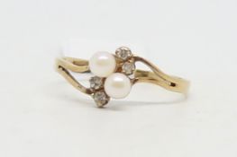 Pearl and diamond twist ring, mounted in 9ct yellow gold rig size N