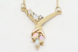 Opal and diamond drop necklace, integrated chain, in 9ct yellow gold