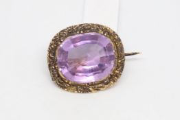 Georgian Amethyst Brooch, large 18x15mm cut amethyst, floral gold border, tested as 9ct or higher,