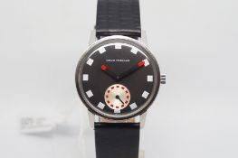 Girard - Perregaux dress watch, circular black dial with block hour markers, red tipped hands,