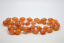 A string of Antique carnelian beads, gross weight approximately 166 grams