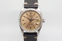 Early Rolex Oyster Perpetual Date Just, Model number 1603, circular patina dial with baton hour