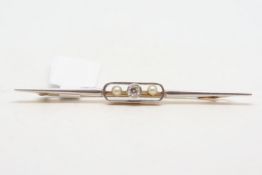 Diamond and pearl bar brooch, central old cut diamond weighing an estimated 0.15ct, with a seed