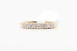 Seven stone diamond half eternity ring, round brilliant cut diamonds, mounted in 9ct yellow gold,